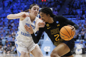 North Carolina uses its own defensive might to take down West Virginia, advances to Sweet 16